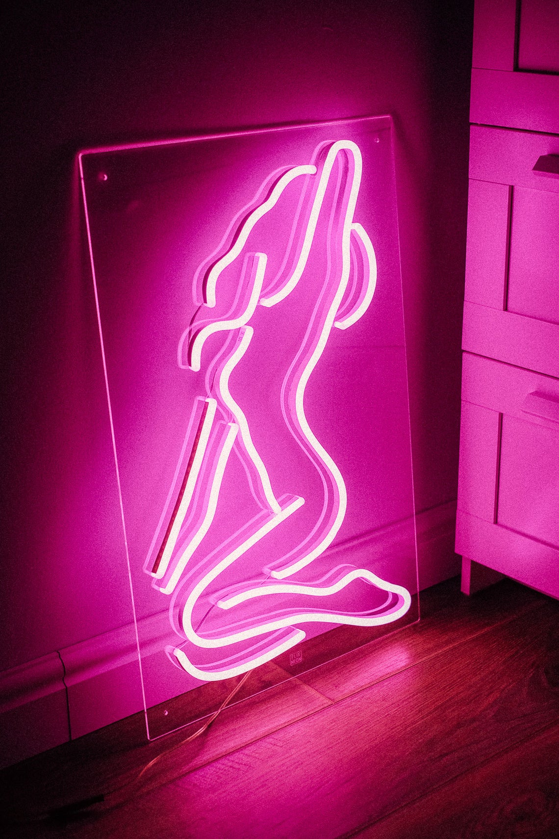 Sexy girl woman pink neon sign for bar, night club, party, erotic striptease