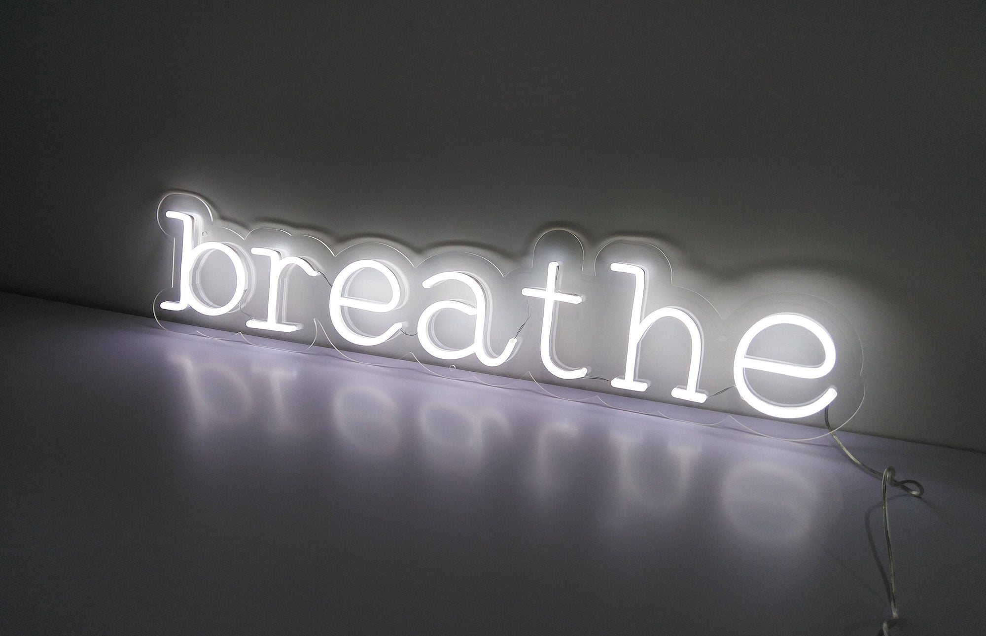 Breathe  neon sign